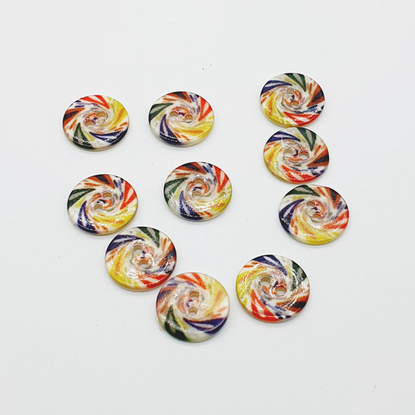 Bottone in madreperla con disegni colorati fantasia spirale mis 24