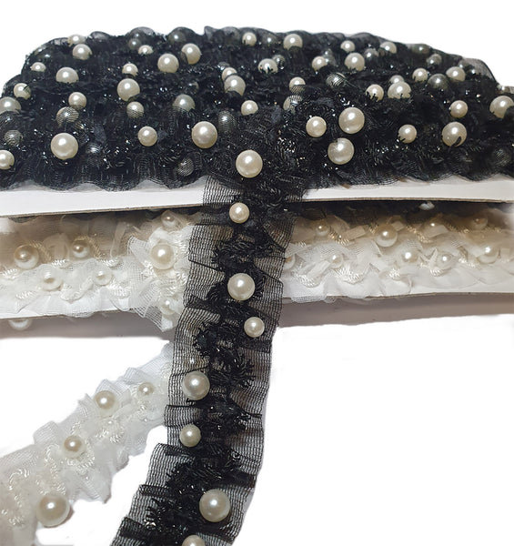 Passamaneria elastica elegante su tulle voile con perle ricamate di due misure, altezza tulle 22 mm.  Insieme colori